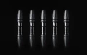 Microphone capsule with black background for professional audio recording.