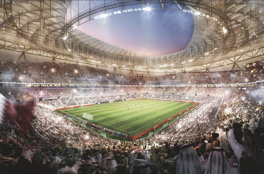 Vibrant soccer stadium filled with fans during a match under a modern roof structure.